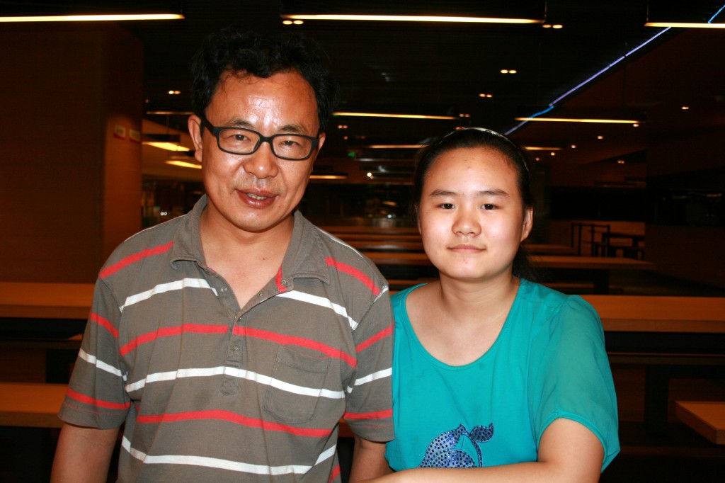 Zhang Lin and his daughter Anni.  Photo credit:  Hu Jia